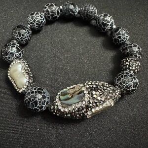 Customized Black/White Crackle Bead Bracelet with Abalone & Hematite Accents.